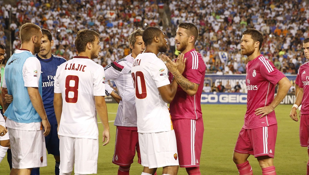 Seydou Keita y Sergio Ramos