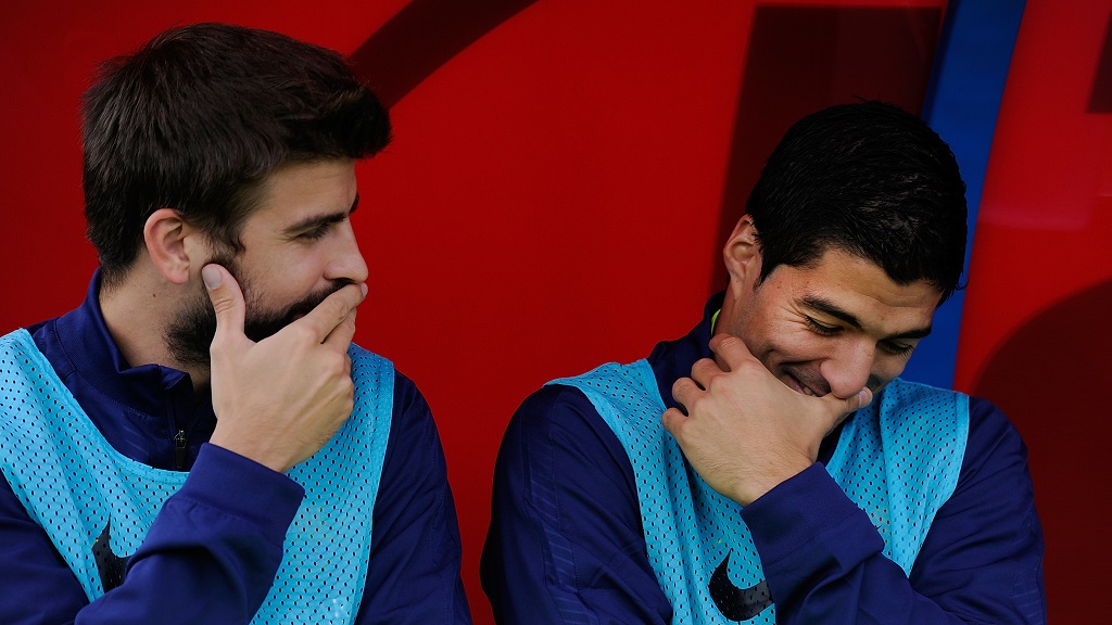 Gerard Pique y Luis Suarez