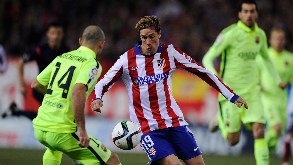 Fernando Torres y Javier Mascherano