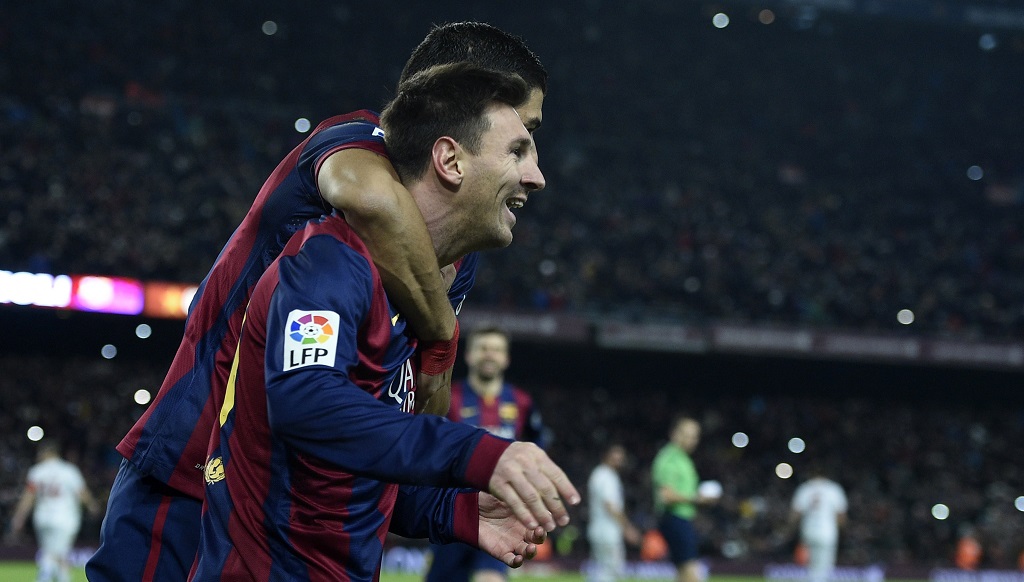 Messi y Suarez celebrando un gol