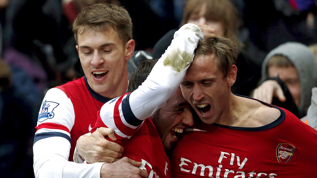 Santi Cazorla y Nacho Monreal