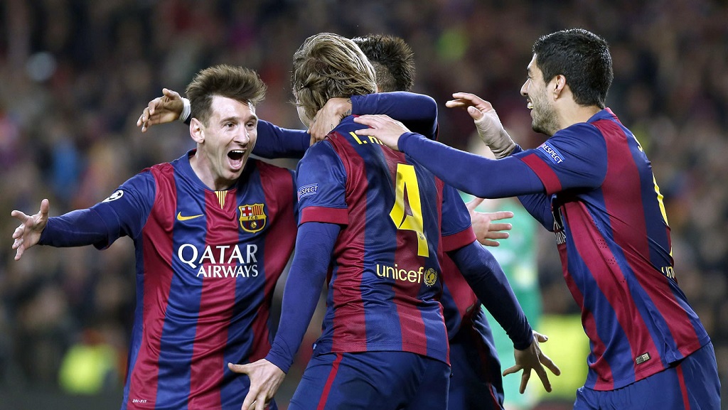 Rakitic celebrando su gol con Messi