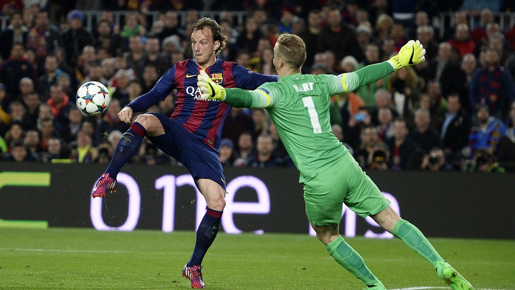 Rakitic y Hart