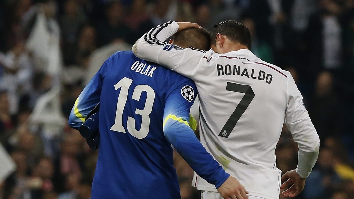 Cristiano Ronaldo y Jan Oblak