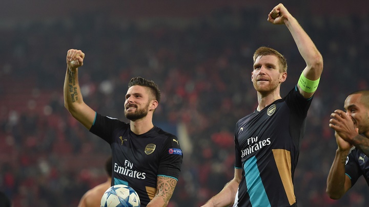 Giroud y Mertesacker