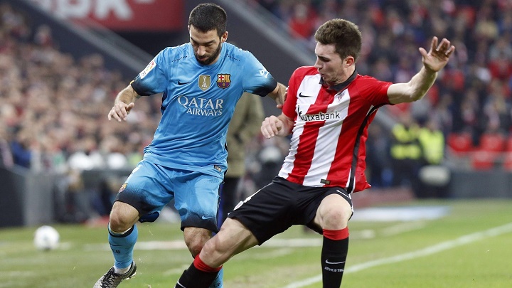 Arda Turan y Laporte