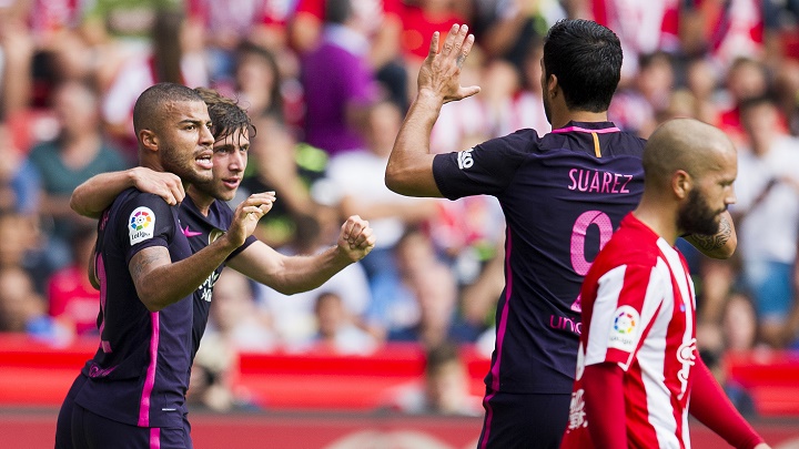 Sergi Roberto Rafinha y Luis Suárez