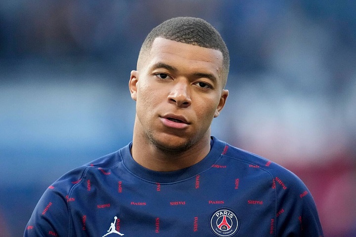 Mbappe-calentando